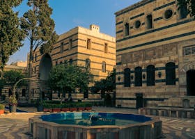 Beautiful historic courtyard with traditional architecture in Damascus, Syria.